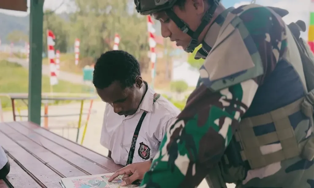 Satgas Yonif 509 Kostrad Gelar Kegiatan Belajar Bersama Anak-Anak Papua di Titik Kuat MambaInta (3)